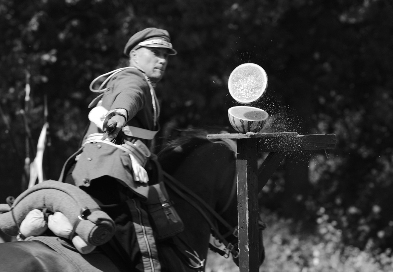 Military picnic and sabre handling demonstration, Warsaw, Poland.